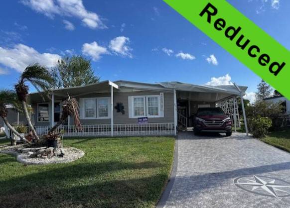 Ellenton, FL Mobile Home for Sale located at 7919 Lakeshore Dr Colony Cove